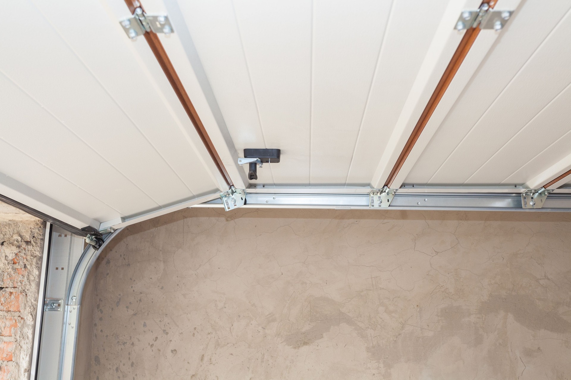 Garage doors installation. Post Rail and Spring Installation / Assembly.